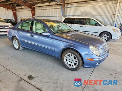 Czwarte zdjęcie samochodu z boku: 2004 MERCEDES-BENZ E 320 4MATIC VIN:WDBUF82J24X111293 - miniatura