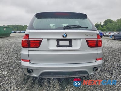 Zdjęcie 6 z 13 samochodu: 2013 BMW X5 XDRIVE35I VIN:5UXZV4C5XD0B06938 - miniatura