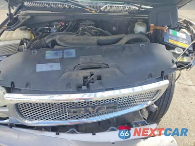 Zdjęcie 12 z 13 samochodu: 2005 GMC YUKON XL DENALI VIN:1GKFK66U75J116304 - miniatura