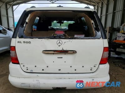 Zdjęcie 6 z 13 samochodu: 2003 MERCEDES-BENZ ML 500 VIN:4JGAB75E43A415649 - miniatura