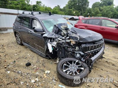 Czwarte zdjęcie samochodu z boku: 2022 JEEP GRAND CHEROKEE VIN:1C4RJHDG5N8591106 - miniatura