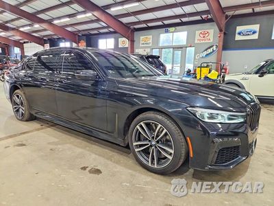 Czwarte zdjęcie samochodu z boku: 2021 BMW 750 XI VIN:WBA7U2C07MCF68499 - miniatura