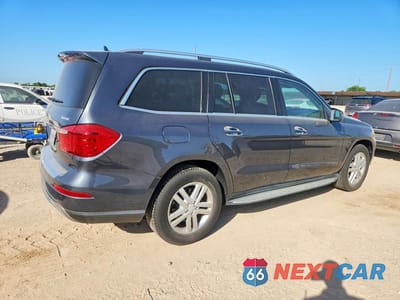 Trzecie zdjęcie samochodu z tyłu: 2013 MERCEDES-BENZ GL 450 4MATIC VIN:4JGDF7CE5DA194651 - miniatura