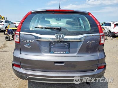 Zdjęcie 6 z 12 samochodu: 2016 HONDA CR-V LX VIN:5J6RM4H3XGL125429 - miniatura