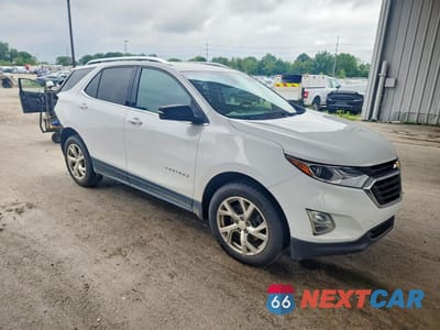 Czwarte zdjęcie samochodu z boku: 2020 CHEVROLET EQUINOX LT VIN:2GNAXLEX9L6182338 - miniatura