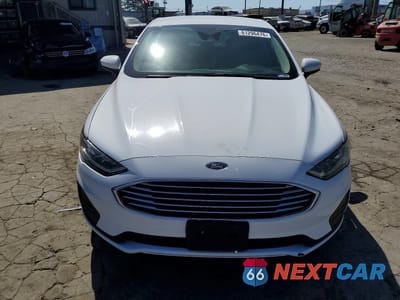 Piąte zdjęcie samochodu w środku: 2019 FORD FUSION S VIN:3FA6P0G75KR108521 - miniatura
