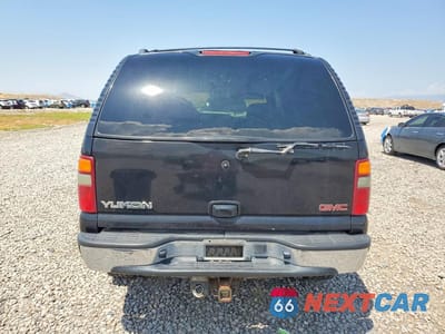 Zdjęcie 6 z 12 samochodu: 2002 GMC YUKON VIN:1GKEK13T82R239651 - miniatura