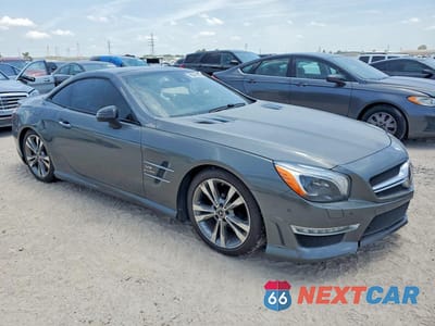 Czwarte zdjęcie samochodu z boku: 2015 MERCEDES-BENZ SL 63 AMG VIN:WDDJK7EAXFF033950 - miniatura