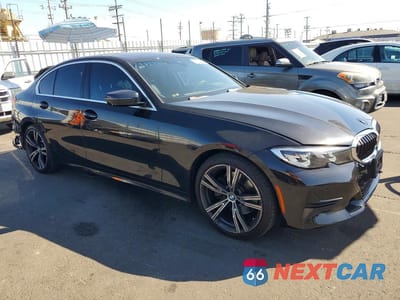 Czwarte zdjęcie samochodu z boku: 2019 BMW 330I VIN:WBA5R1C54KFH13332 - miniatura