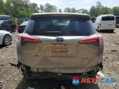 Zdjęcie 6 z 13 samochodu: 2018 TOYOTA RAV4 HYBRID XLE VIN:JTMRJREV4JD254124 - miniatura
