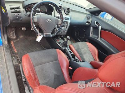 Zdjęcie 8 z 12 samochodu: 2007 HYUNDAI TIBURON GT VIN:KMHHN66F47U237219 - miniatura