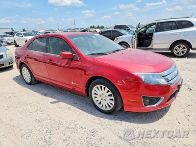 Czwarte zdjęcie samochodu z boku: 2012 FORD FUSION HYBRID VIN:3FADP0L38CR301354 - miniatura