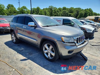 Czwarte zdjęcie samochodu z boku: 2012 JEEP GRAND CHEROKEE OVERLAND VIN:1C4RJFCT3CC192059 - miniatura