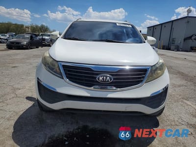 Piąte zdjęcie samochodu w środku: 2013 KIA SPORTAGE LX VIN:KNDPB3A24D7494175 - miniatura