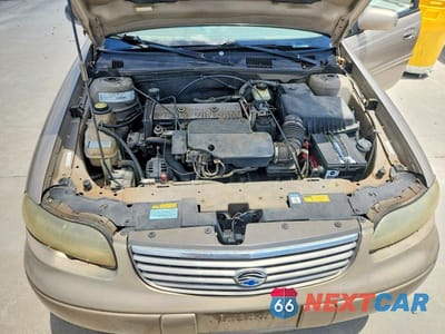 Zdjęcie 11 z 12 samochodu: 1998 CHEVROLET MALIBU VIN:1G1ND52T5WY115050 - miniatura