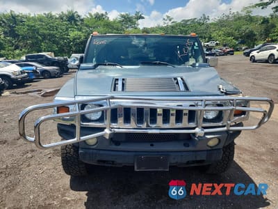Piąte zdjęcie samochodu w środku: 2005 HUMMER H2 VIN:5GRGN23U55H125352 - miniatura