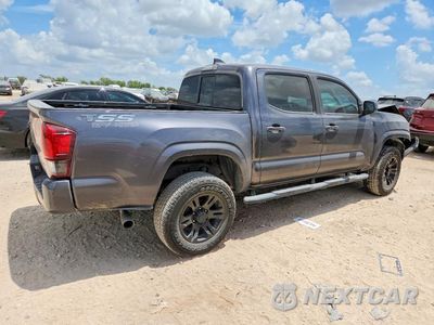 Trzecie zdjęcie samochodu z tyłu: 2022 TOYOTA TACOMA SR VIN:3TYAX5GN6NT045273 - miniatura