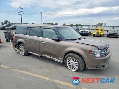 Czwarte zdjęcie samochodu z boku: 2019 FORD FLEX SEL VIN:2FMGK5C82KBA32243 - miniatura