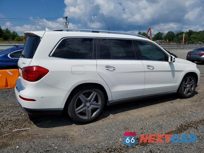 Trzecie zdjęcie samochodu z tyłu: 2014 MERCEDES-BENZ GL 450 4MATIC VIN:4JGDF7CE1EA325138 - miniatura