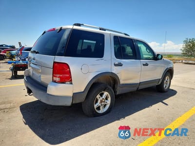 Trzecie zdjęcie samochodu z tyłu: 2003 FORD EXPLORER XLT VIN:1FMZU73K83ZB31657 - miniatura