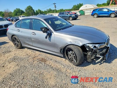 Czwarte zdjęcie samochodu z boku: 2023 BMW 330XI VIN:3MW89FF07P8C80354 - miniatura
