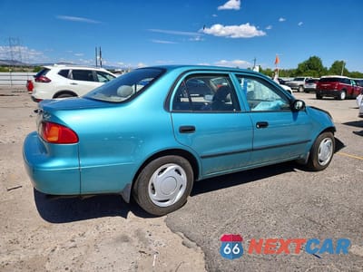 Trzecie zdjęcie samochodu z tyłu: 1999 TOYOTA COROLLA VE VIN:1NXBR12E7XZ262948 - miniatura