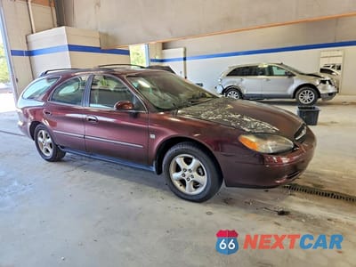 Czwarte zdjęcie samochodu z boku: 2000 FORD TAURUS SE VIN:1FAFP58S0YA232280 - miniatura
