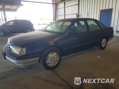 1990 FORD TAURUS GL 1FACP52U3LA112026 - główne zdjęcie licytacji z USA - miniatura
