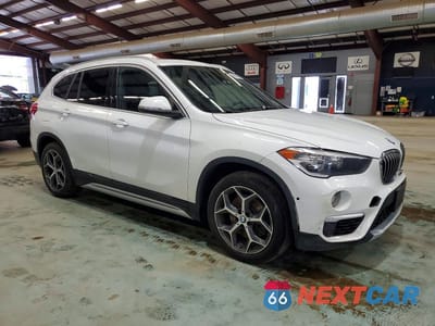 Czwarte zdjęcie samochodu z boku: 2018 BMW X1 XDRIVE28I VIN:WBXHT3C34J5L30734 - miniatura