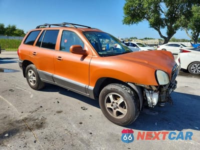 Czwarte zdjęcie samochodu z boku: 2002 HYUNDAI SANTA FE GLS VIN:KM8SC13D72U204399 - miniatura