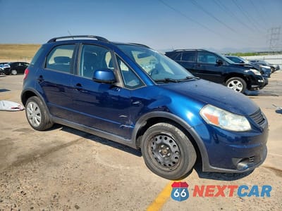 Czwarte zdjęcie samochodu z boku: 2011 SUZUKI SX4 VIN:JS2YB5A30B6300954 - miniatura
