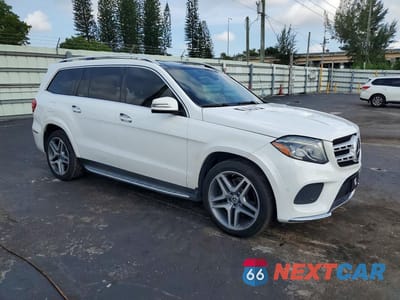 Czwarte zdjęcie samochodu z boku: 2017 MERCEDES-BENZ GLS 550 4MATIC VIN:4JGDF7DE5HA989526 - miniatura