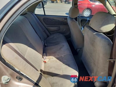 Zdjęcie 10 z 12 samochodu: 1999 TOYOTA COROLLA VE VIN:1NXBR12E1XZ140053 - miniatura