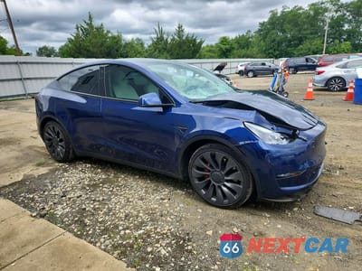 Czwarte zdjęcie samochodu z boku: 2022 TESLA MODEL Y VIN:7SAYGDEF3NF530378 - miniatura