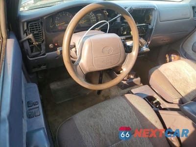 Zdjęcie 8 z 12 samochodu: 1999 TOYOTA TACOMA BASE VIN:4TAVL52NXXZ411071 - miniatura