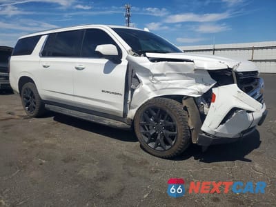 Czwarte zdjęcie samochodu z boku: 2021 CHEVROLET SUBURBAN C1500 LT VIN:1GNSCCKD0MR259212 - miniatura