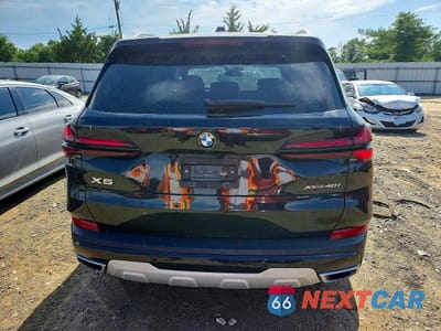 Zdjęcie 6 z 13 samochodu: 2025 BMW X5 XDRIVE45E VIN:5UX23EU09S9Z50751 - miniatura
