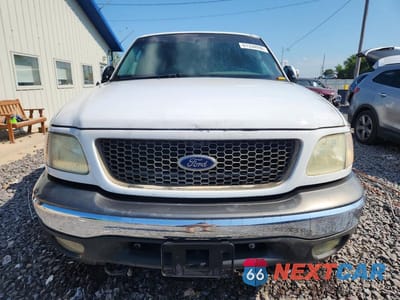 Piąte zdjęcie samochodu w środku: 2003 FORD F150 VIN:1FTRX18L63NA87028 - miniatura