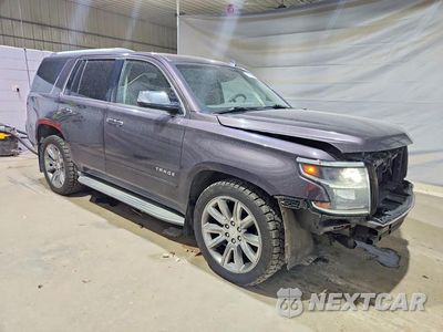 Czwarte zdjęcie samochodu z boku: 2015 CHEVROLET TAHOE K1500 LTZ VIN:1GNSKCKC1FR227639 - miniatura