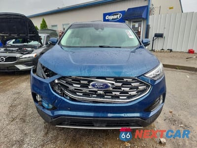Piąte zdjęcie samochodu w środku: 2020 FORD EDGE TITANIUM VIN:2FMPK3K97LBA96455 - miniatura