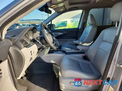 Zdjęcie 7 z 14 samochodu: 2019 HONDA PILOT TOURING VIN:5FNYF5H64KB044384 - miniatura