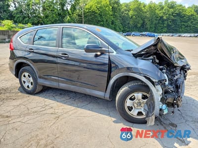 Czwarte zdjęcie samochodu z boku: 2016 HONDA CR-V LX VIN:5J6RM4H3XGL137080 - miniatura