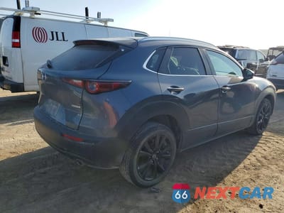 Trzecie zdjęcie samochodu z tyłu: 2024 MAZDA CX-30 PREFERRED VIN:3MVDMBCM8RM646802 - miniatura