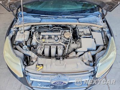 Zdjęcie 12 z 13 samochodu: 2013 FORD FOCUS SE VIN:1FADP3F27DL291288 - miniatura