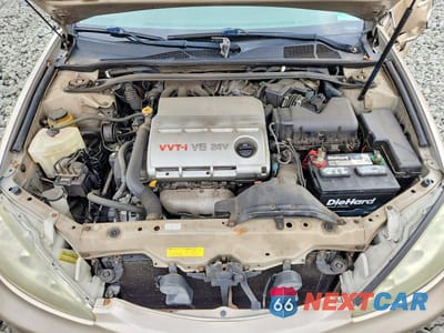 Zdjęcie 11 z 12 samochodu: 2005 TOYOTA CAMRY LE V6 VIN:4T1BF32K45U110018 - miniatura