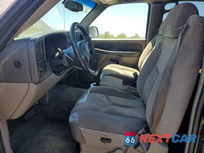 Zdjęcie 7 z 13 samochodu: 2003 GMC YUKON VIN:1GKEC13VX3R311711 - miniatura