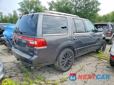 Trzecie zdjęcie samochodu z tyłu: 2015 LINCOLN NAVIGATOR VIN:5LMJJ2HT2FEJ04117 - miniatura