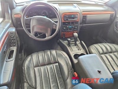 Zdjęcie 8 z 12 samochodu: 1999 JEEP GRAND CHEROKEE LIMITED VIN:1J4GW68N4XC689107 - miniatura