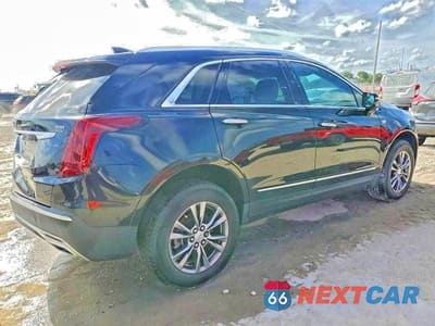 Trzecie zdjęcie samochodu z tyłu: 2021 CADILLAC XT5 PREMIUM LUXURY VIN:1GYKNCRS0MZ173433 - miniatura