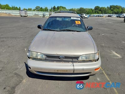 Piąte zdjęcie samochodu w środku: 1994 TOYOTA COROLLA DX VIN:JT2AE09V5R0048149 - miniatura